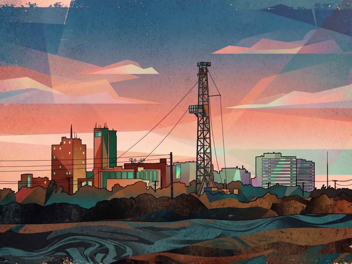 Midland skyline with a West Texas drilling rig at sunset